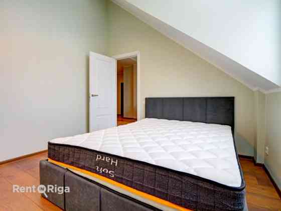 Предлагается уникальная мансардная квартира в новом проекте на улице Katoļu 11  с Рига