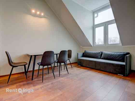 Предлагается уникальная мансардная квартира в новом проекте на улице Katoļu 11  с Рига