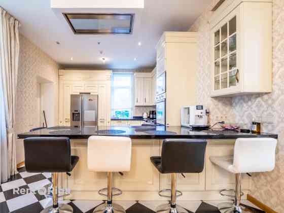 An elegant brick private house for sale in one of Rigas most sought-after neighborhoods  Mežaparks.  Rīga