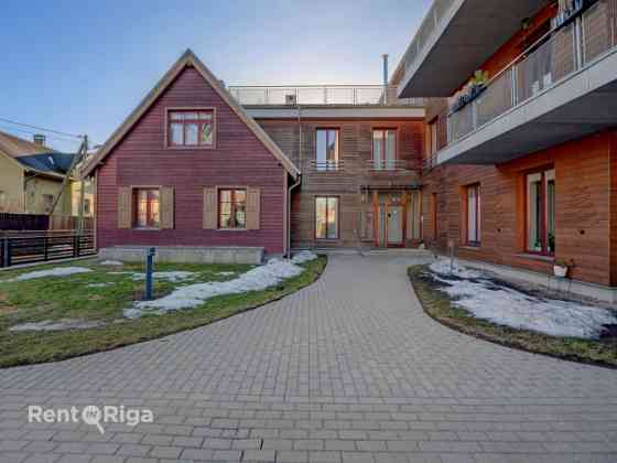 Эксклюзивная квартира с камином, террасой 106 кв.м и 2 подземными парковочными Rīga