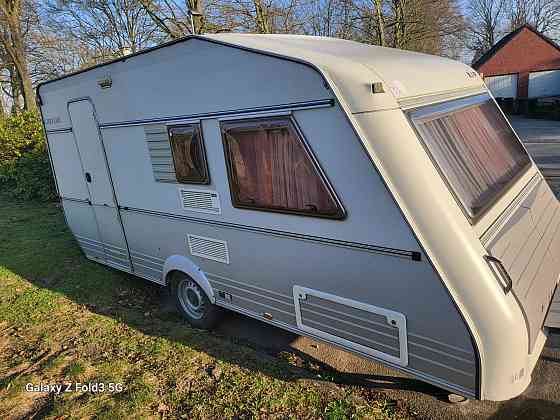 Прекрасный и очень ухоженный прицеп KIP 440 Grey-Line с двумя зонами отдыха, тентом, 3-точечным... Рига