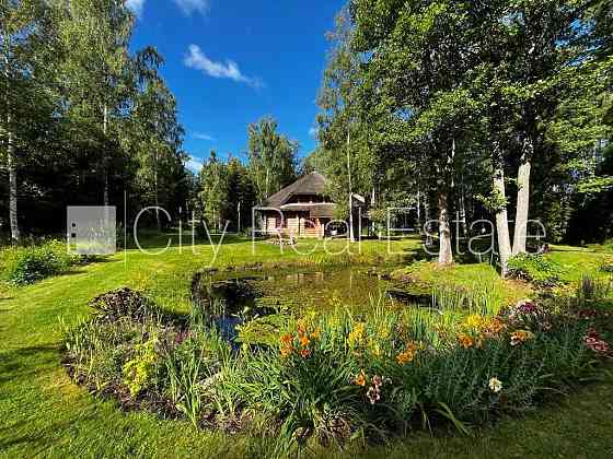 Благоустроенная озеленённая территория, количество спален 4 шт., тепловой насос, Талси и район