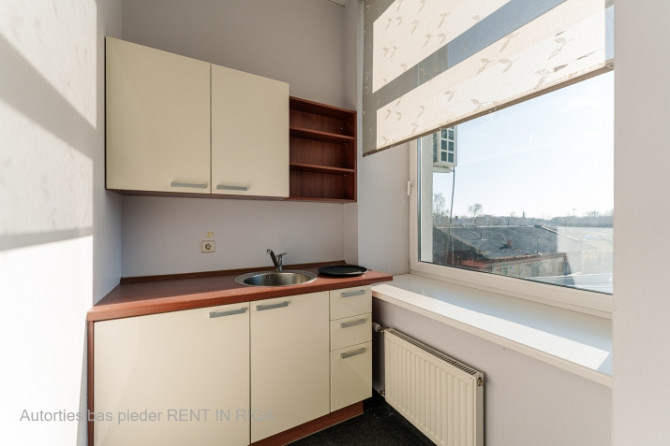 Birojs Pārdaugavā, pretī 