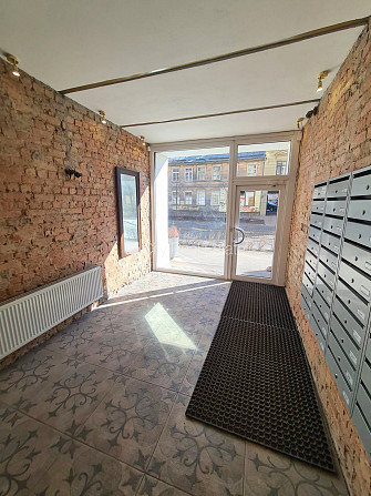 Pagalma ēka, renovēta māja, slēgts pagalms, ieeja no pagalma, kāpņu telpa pēc kosmētiskā Rīga - foto 16