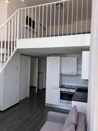 Сдаётся современная двухуровневая квартира в стиле лофт с высокими потолками и Rīga