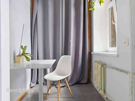 Quiet, bright, and sunny apartment on Stabu Street.  The apartment features four rooms (1724 m), thr Rīga