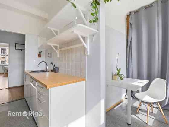 Quiet, bright, and sunny apartment on Stabu Street.  The apartment features four rooms (1724 m), thr Rīga