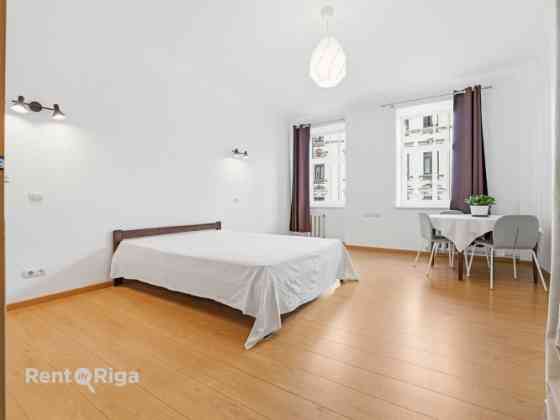 Quiet, bright, and sunny apartment on Stabu Street.  The apartment features four rooms (1724 m), thr Rīga
