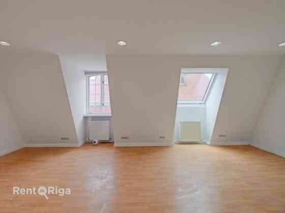 Two-Level Apartment in Jacob's Barracks  The first level features a spacious kitchen, a separate bed Rīga
