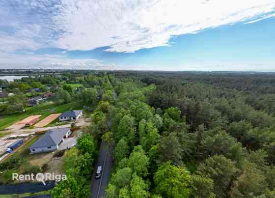 Land plot between Jaunciema gatve and the forest.  The property is located along Jaunciema gatve, be Rīga