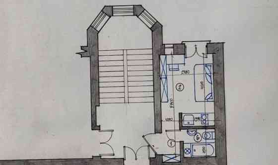 The apartment is located at 22 Skolas Street.  The apartment is in fair condition and requires cosme Рига