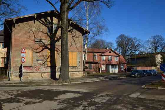 Premises located on the ground floor of a wooden residential building.  Total area of the premises:  Рига