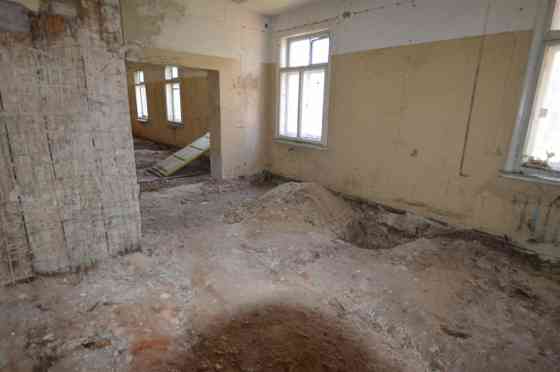 Premises located on the ground floor of a wooden residential building.  Total area of the premises:  Рига