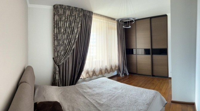 Tiek izīrēts pēdējā stāva dzīvoklis ar lielu terasi (50 m2) Jaunajā Teikā. Dzīvojamā platība 94 m2.  Рига - изображение 8