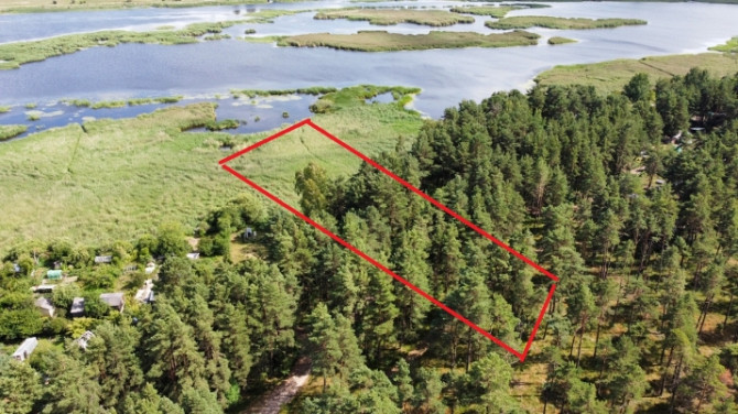 Pārdošanā zeme 1.līnijā pie ūdens. 5510 m2 liels zemes gabals Mangaļsalā, robežojas ar Rīga - foto 1