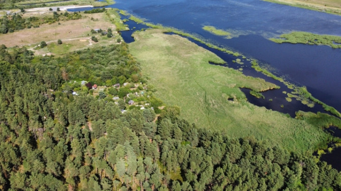 Pārdošanā zeme 1.līnijā pie ūdens. 5510 m2 liels zemes gabals Mangaļsalā, robežojas ar Rīga - foto 9