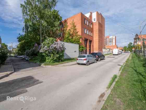 Multi-functional building with land.  A 4-storey building is for sale, currently housing a Vesko sto Rīga