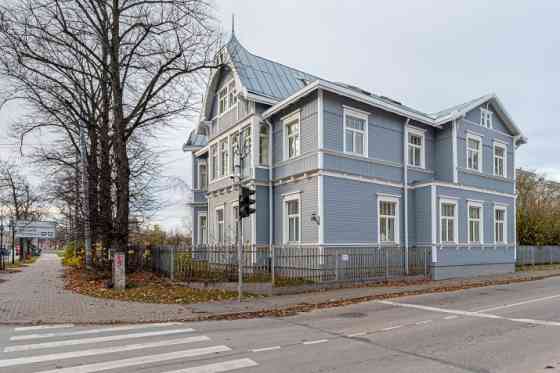 Renovated office building with a large parking lot that can be used for various types of business.   Rīga