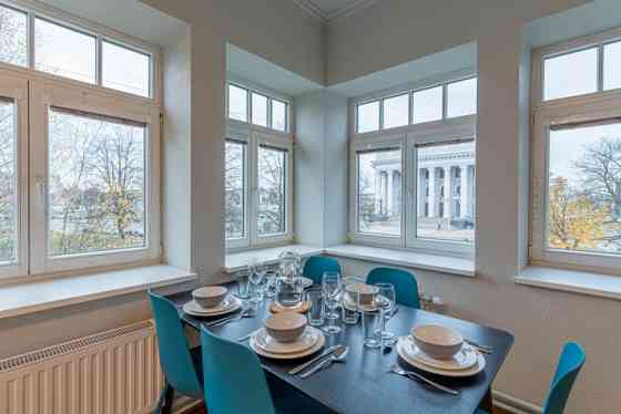 Renovated office building with a large parking lot that can be used for various types of business.   Rīga