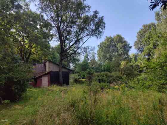Land plot on K.Ulmaņa Highway.  There is currently a residential house on the property, which has be Rīga