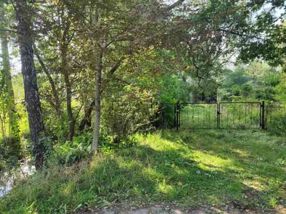 Land plot on K.Ulmaņa Highway.  There is currently a residential house on the property, which has be Rīga