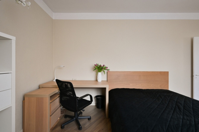 A furnished two-bedroom apartment in the very center of the city, which at the same time allows you  Рига - изображение 16